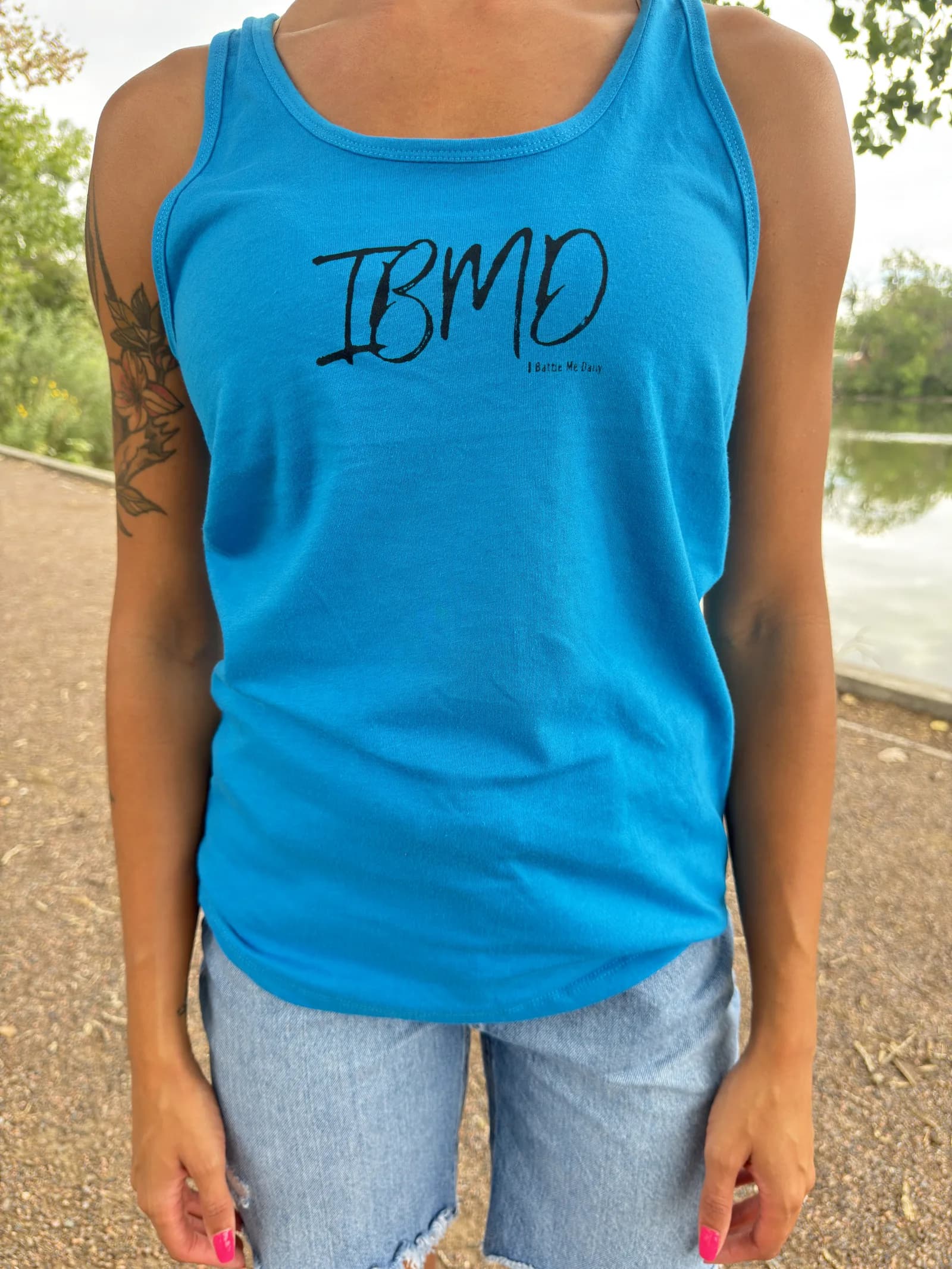 IBMD Racerback Tank — Turquoise — model wearing IBMD racerback tank