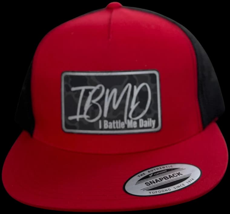 IBMD Richardson 112 trucker hat — Fire Red / Camo