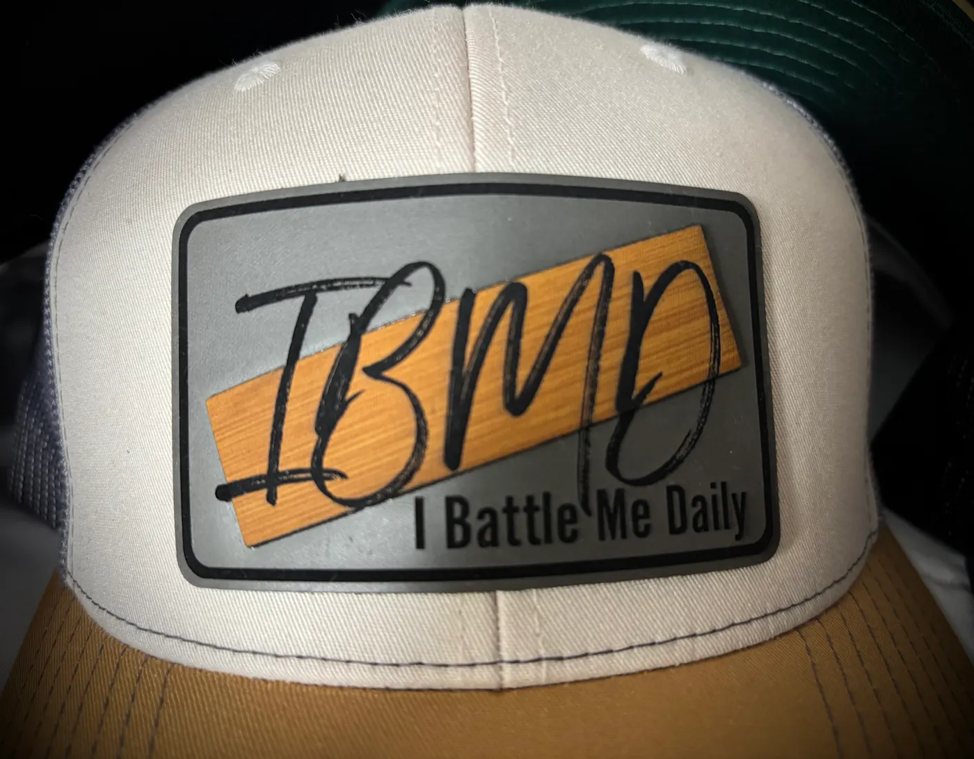 IBMD Richardson 112 trucker hat — Ivory / Gold
